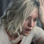 Grace aus Resident Evil Requiem wie sie sich die Preview zu DLSS 5 anguckt und vollkommen geschockt ist.