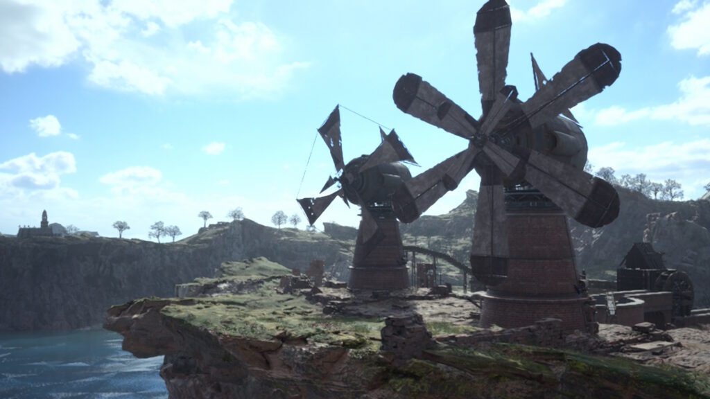 Screenshot aus Final Fantasy VII: Rebirth. Das erste Gebiet, nach dem man die Anfangsstadt verlassen hat. Wir sehen auf der rechten Seite zwei Windmühlen, im Hintergrund einige Felden und rechts unten Wasser.